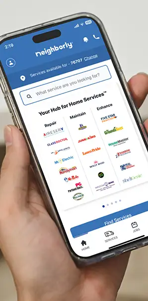 A view of the Neighborly app on a smartphone from over a customer's shoulder.