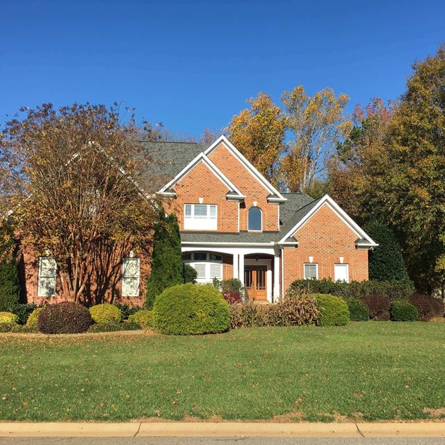 A beautiful home with lawn in front