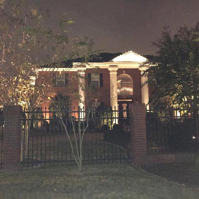 Front View of the house with night lighting