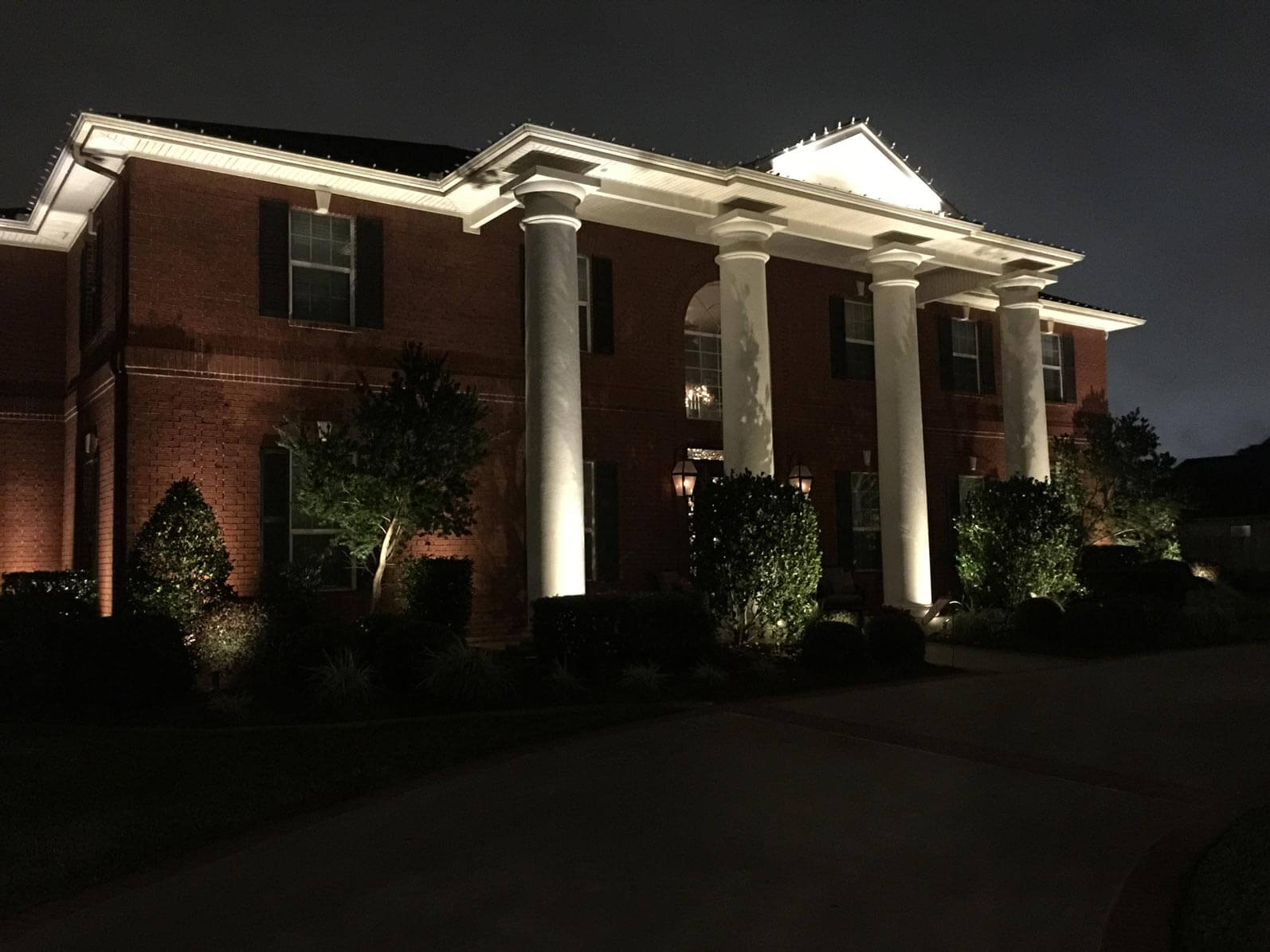 Front of house with night lighting 