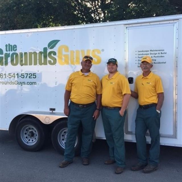Ground guys posing for a photograph