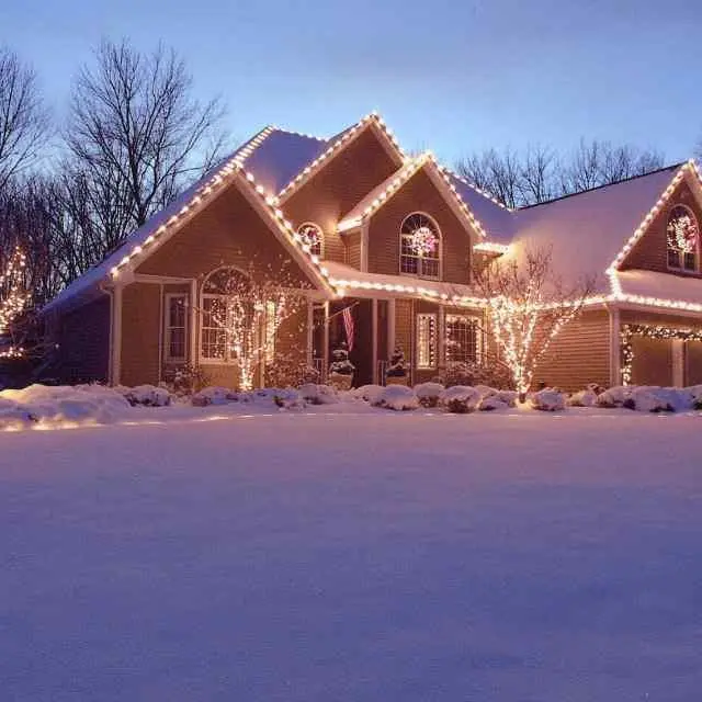 holiday lights on a house at night