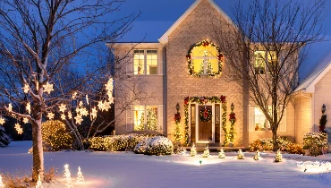 Stately home with Christmas lights displayed | The Grounds Guys of Gettysburg