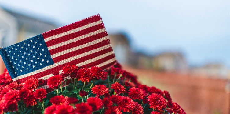 Small American flag in flower pot | The Grounds Guys of Gettysburg