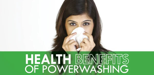 Woman blowing her nose with text: "Health benefits of powerwashing"