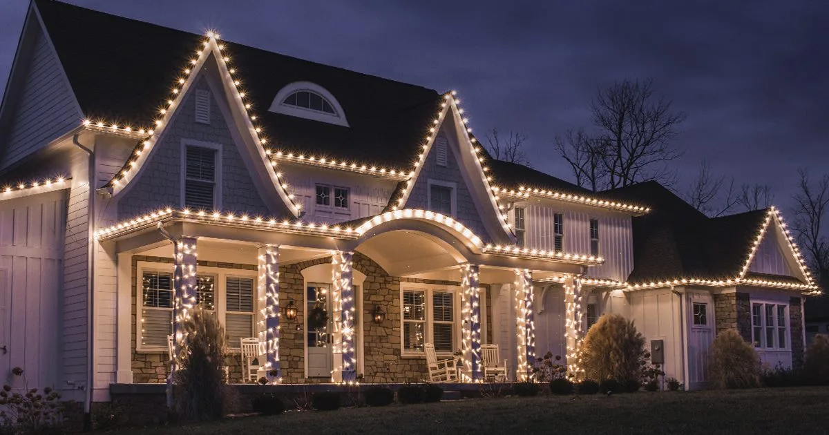 Home with holiday lighting installed by Grounds Guys of McKinney, TX