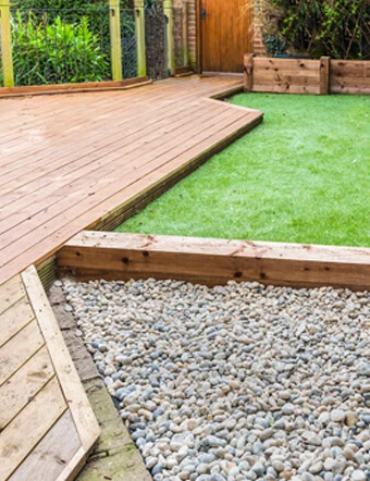 Hardscape with grass and nice deck